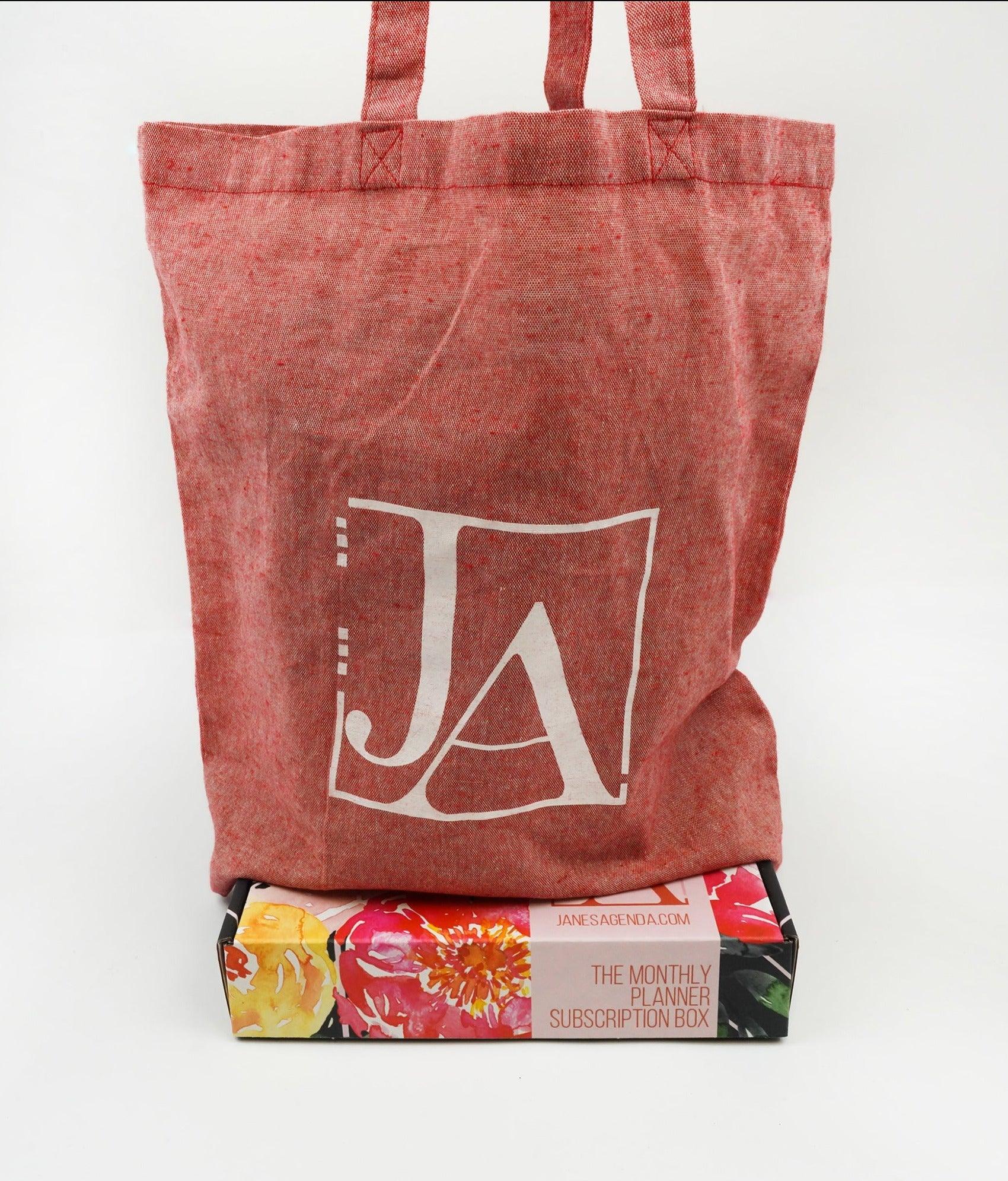 Planner and tote bag by Jane's Agenda, a planner lifestyle brand.