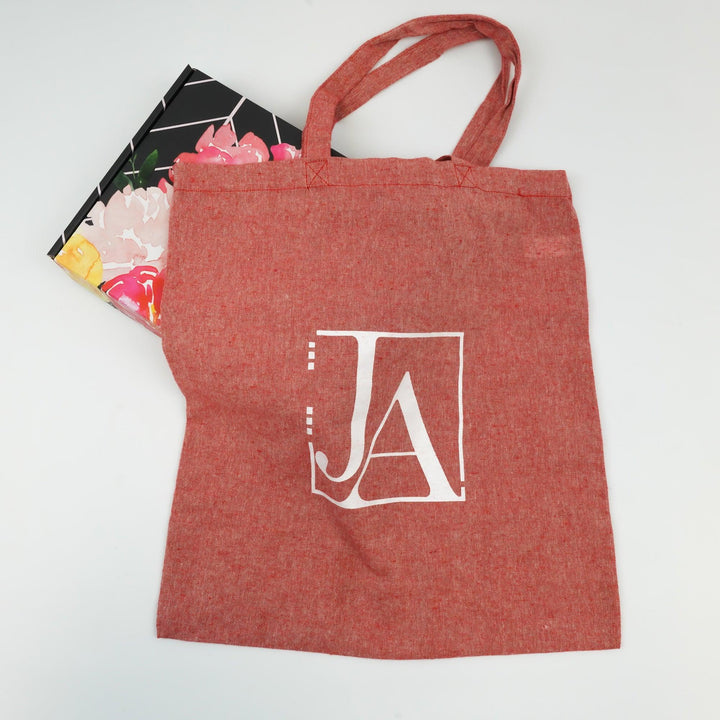 Planner and tote bag by Jane's Agenda, a planner lifestyle brand.